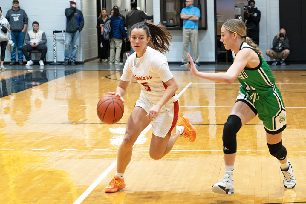 Worthington Christian's Jamie Custer dribbles basketball