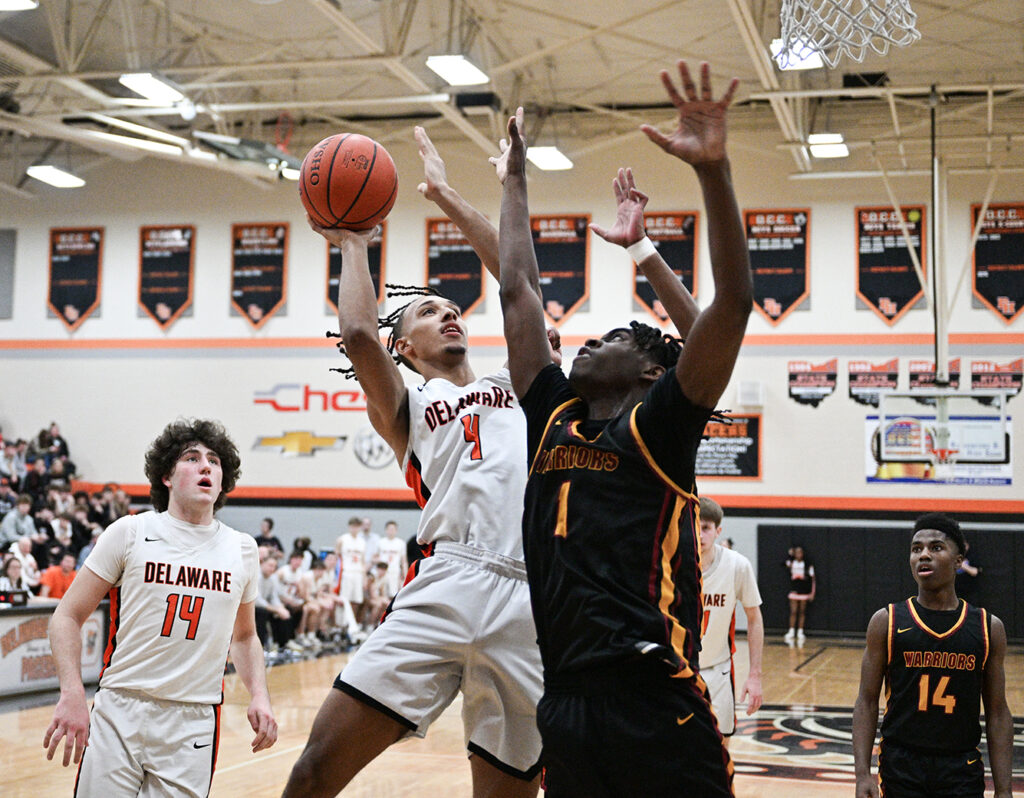 Delaware's Will Sims shoots basketball