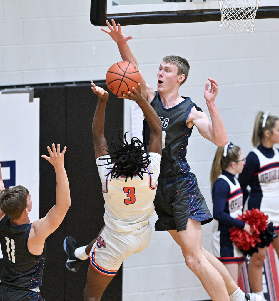 Grove City's Kraig Gilbert defends shot