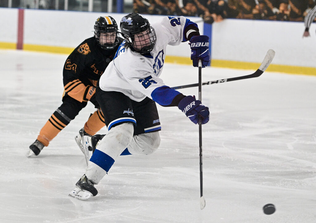 Olentangy Liberty’s Carter Randle shoots puck