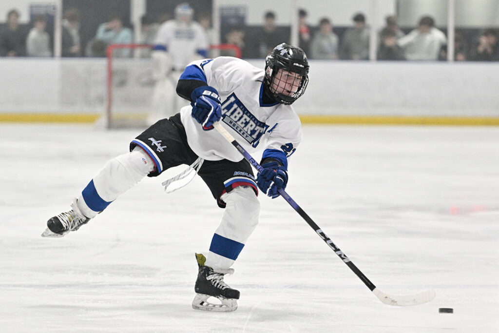 Olentangy Liberty’s Jake Struck shoots puck