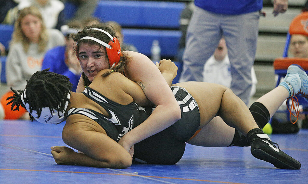 Olentangy Orange's Kascidy Garren wrestles on mat