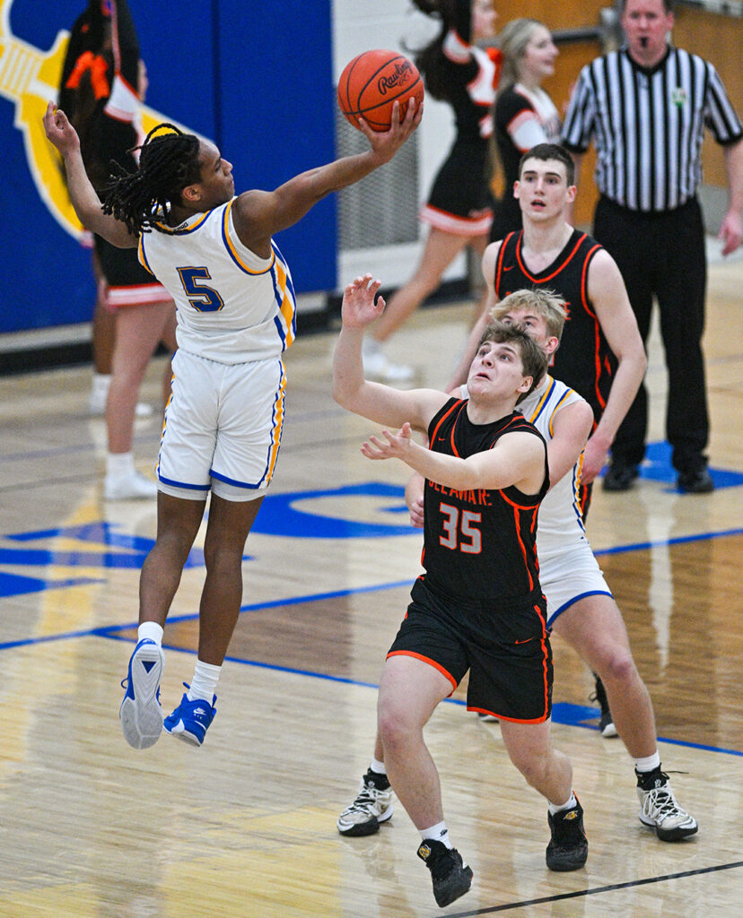 Olentangy's Jackson Wiley leaps for ball