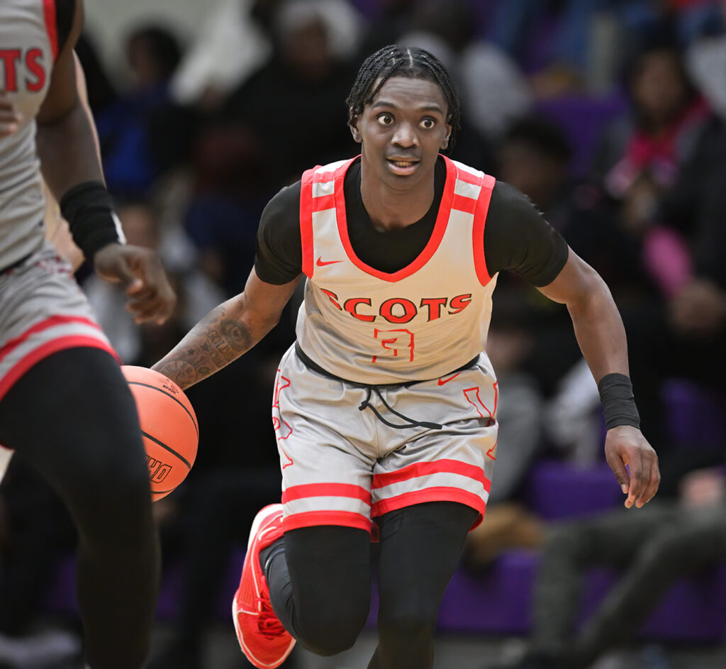 Walnut Ridge’s Dominique Aekins dribbles