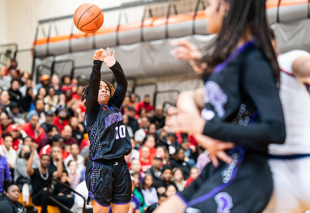 Africentric's Jayona Overby shoots basketball