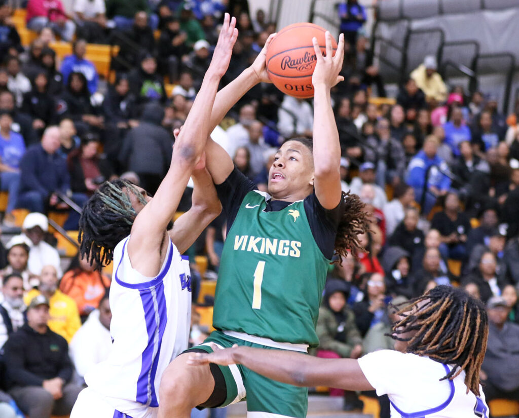 Northland's King Kendrick shoots basketball