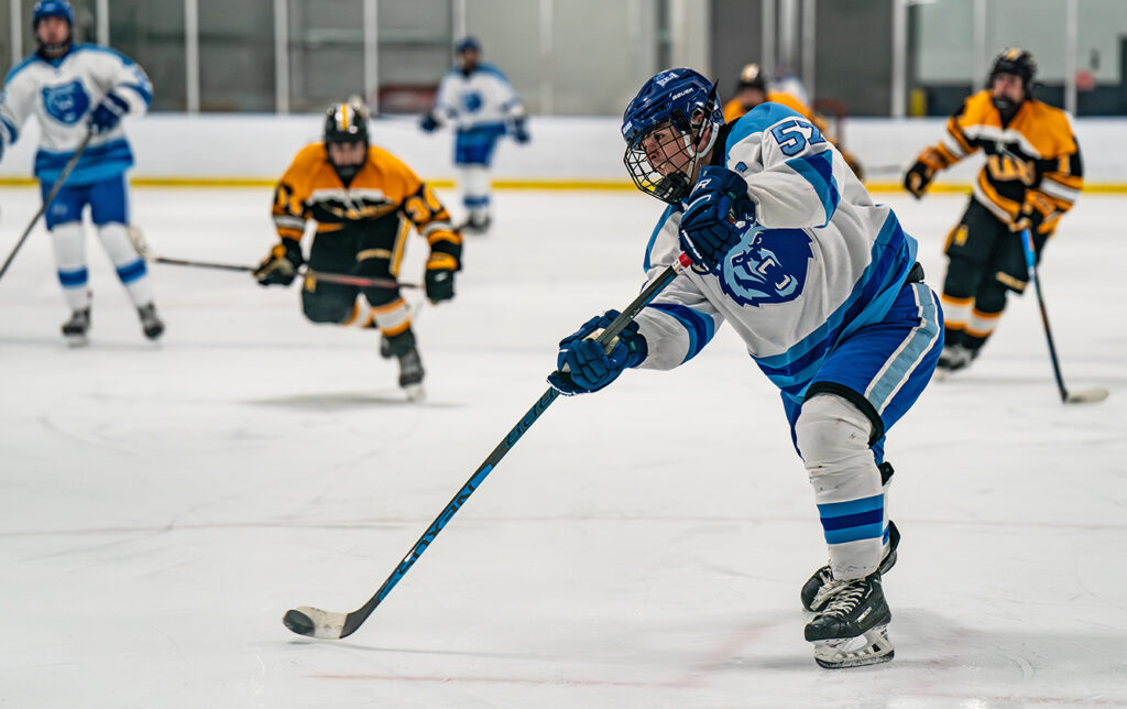 Olentangy Berlin's Chris Brennan shoots puck