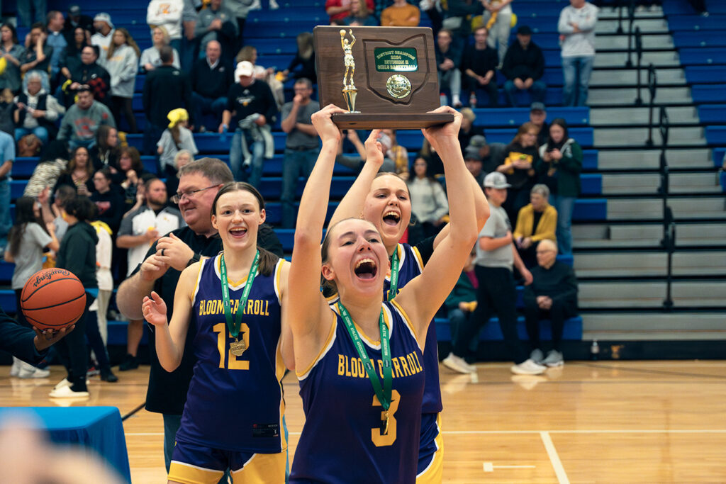 Bloom-Carroll's Emily Bratton holds trophy