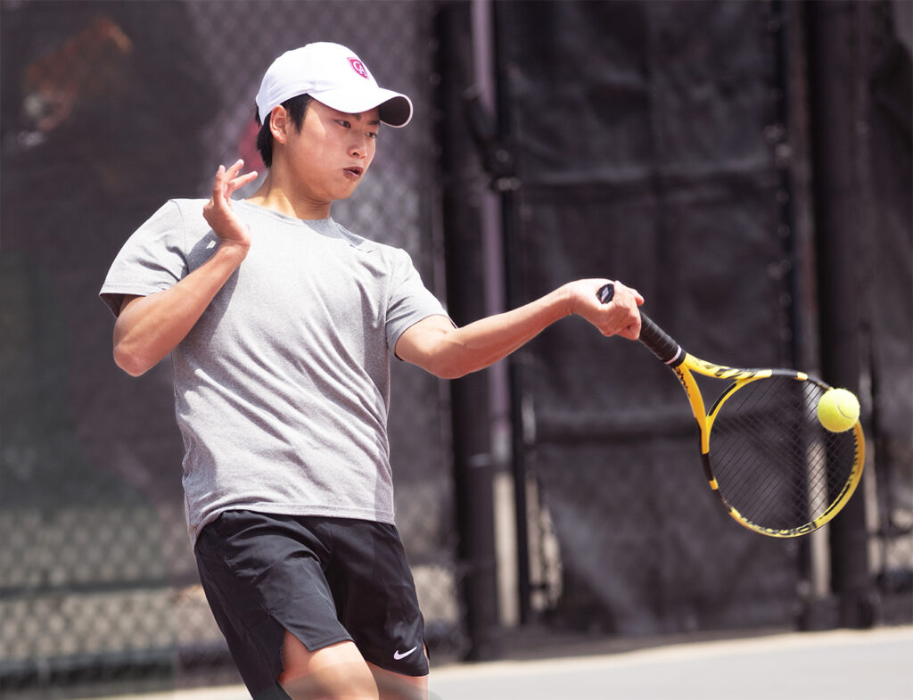 Academy's Rowen Lo hits tennis ball