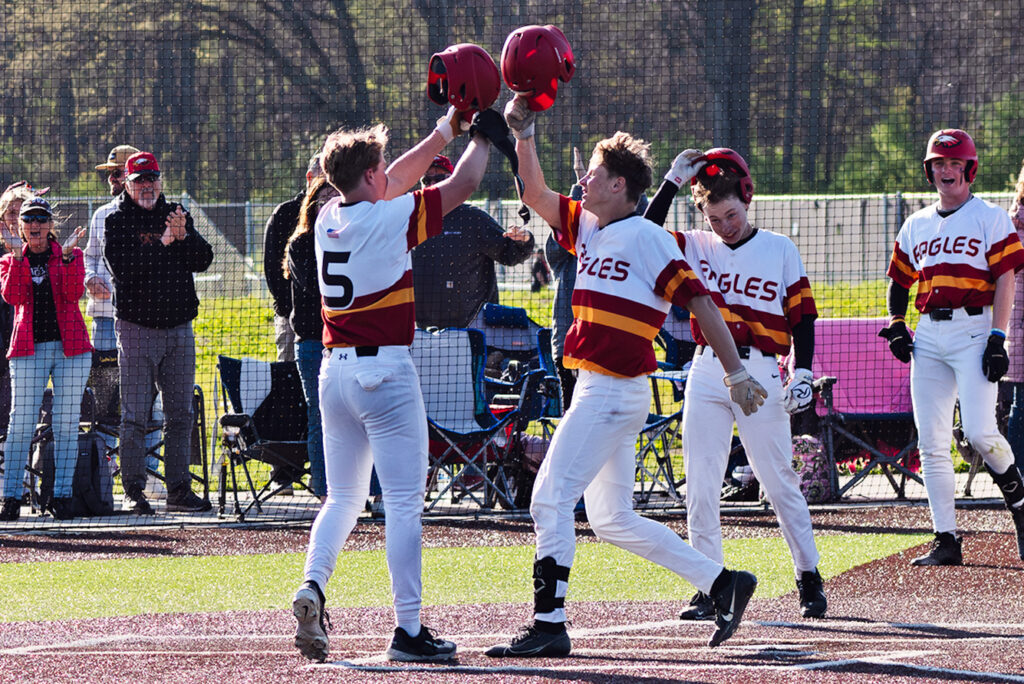 Big Walnut's Nolan Buirley greeted at plate after homer