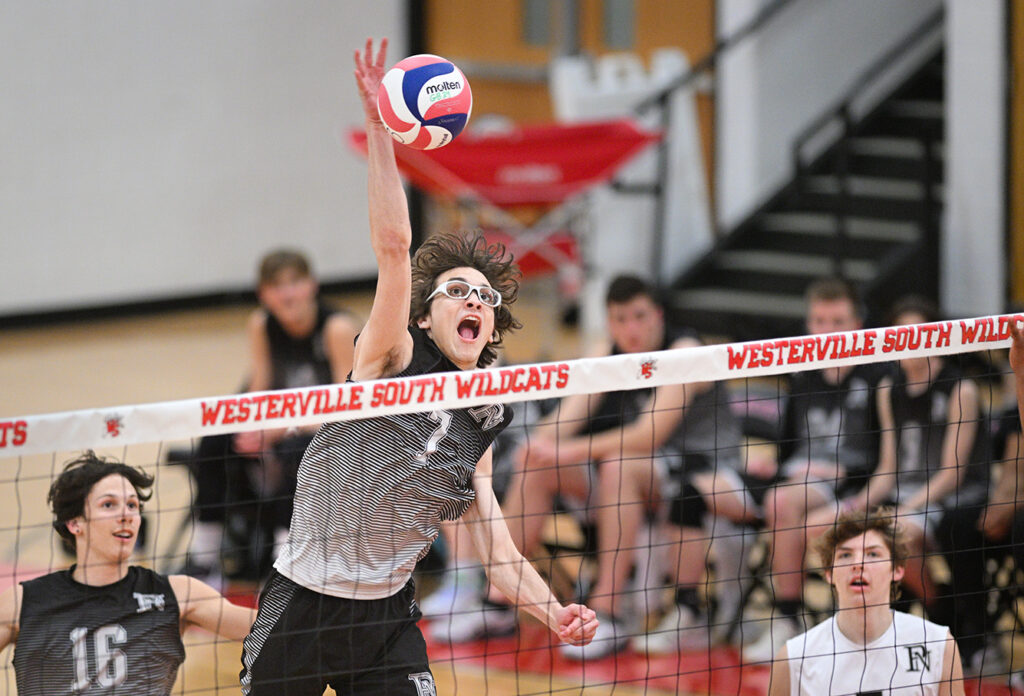 Pickerington North's Jackson VanWormer hits volleyball