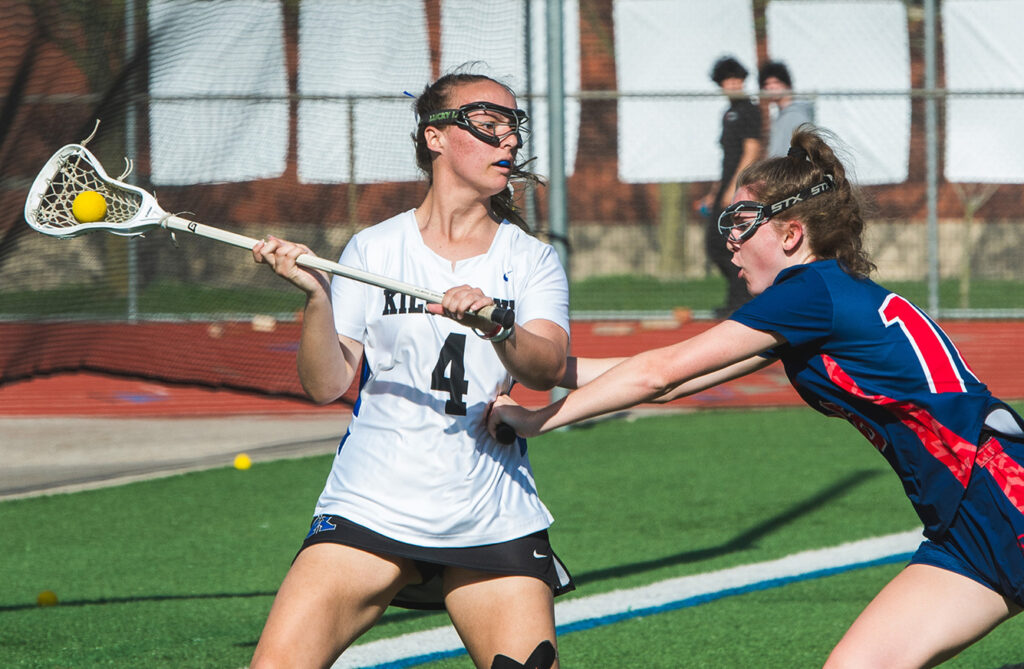 Worthington Kilbourne's Addie Hale looks to pass