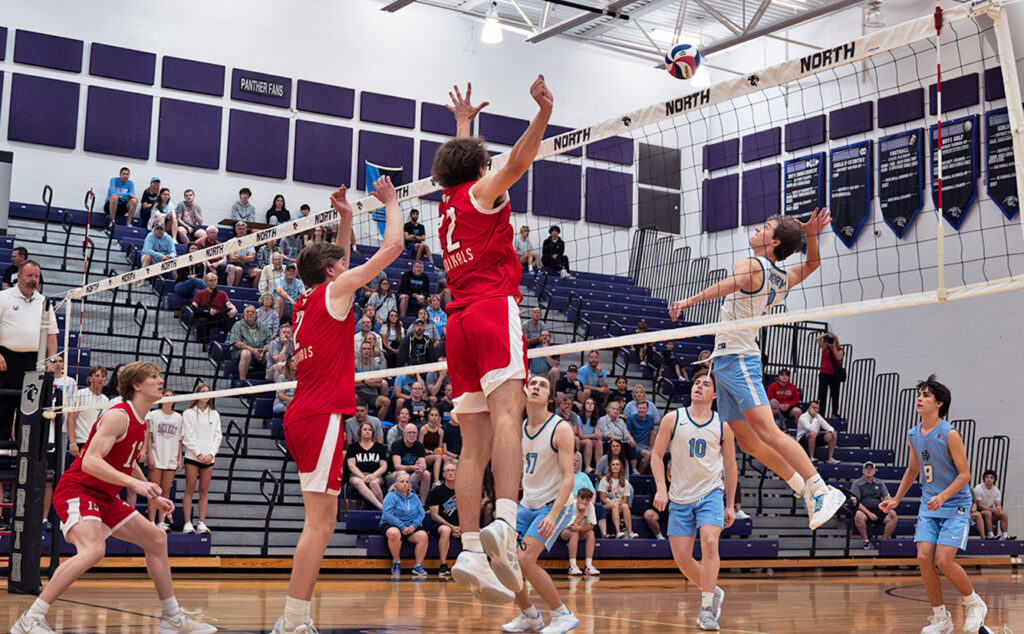 Hilliard Darby's Aidan Kolb hits at net