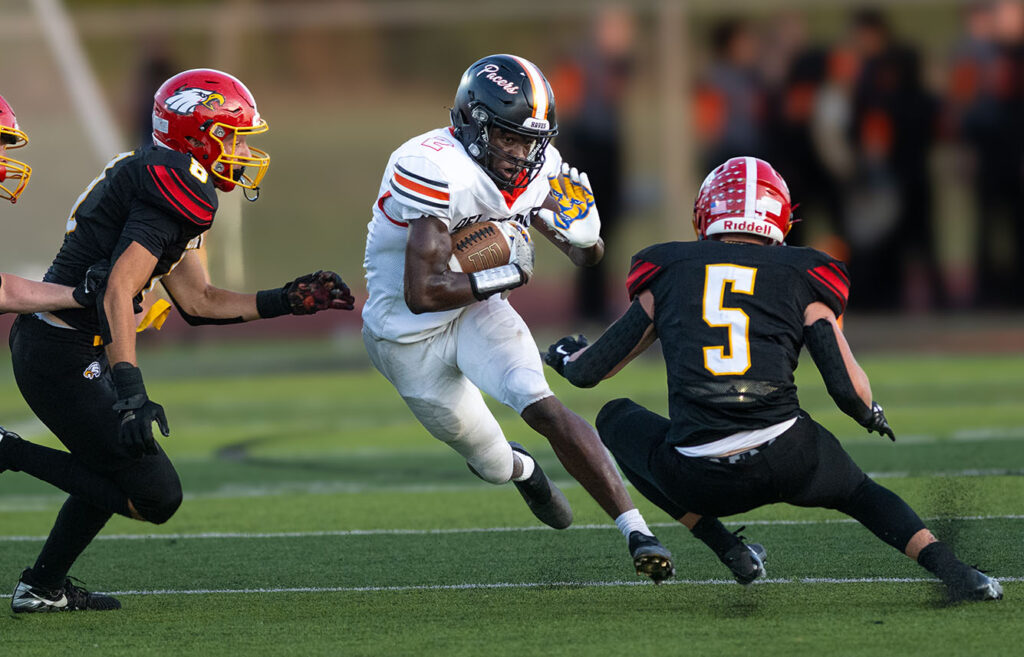 Delaware's Favour Akih cuts with ball