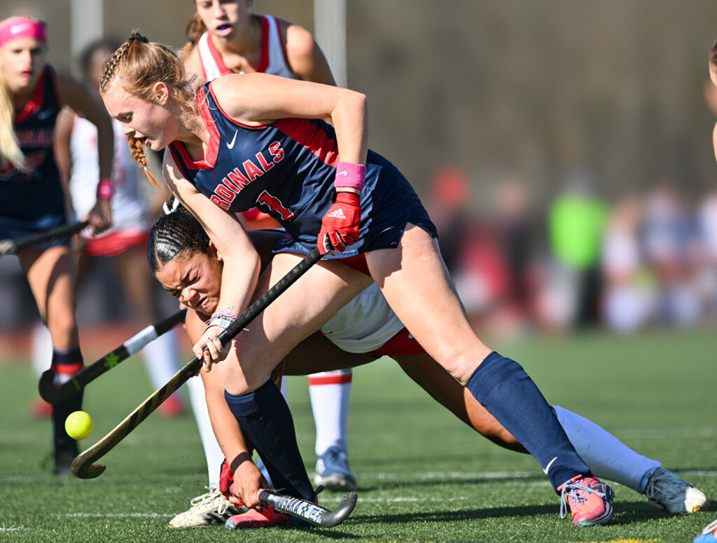 Thomas Worthington's Rowan Casey moves the ball