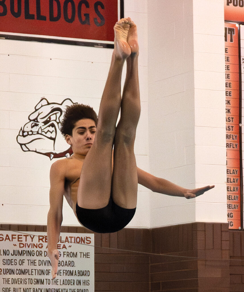 Bexley's Jackson Monus dives off board