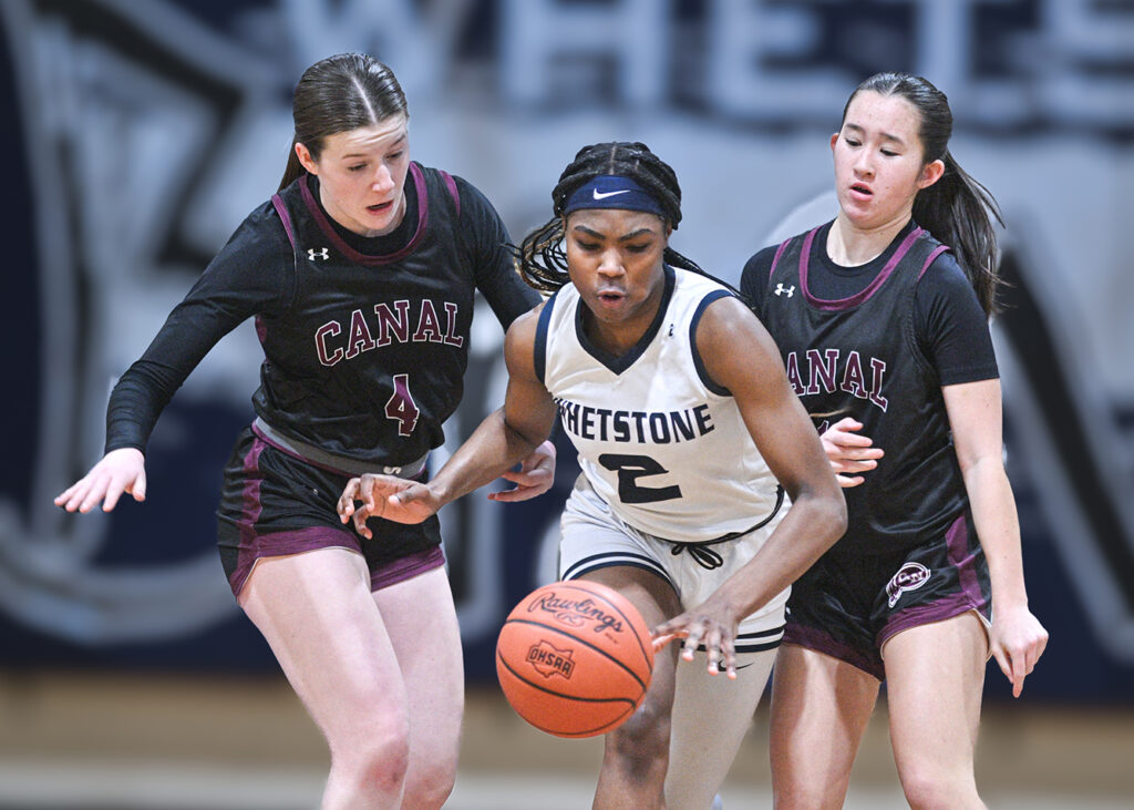 Whetstone's Caniya Woods dribbles through traffic