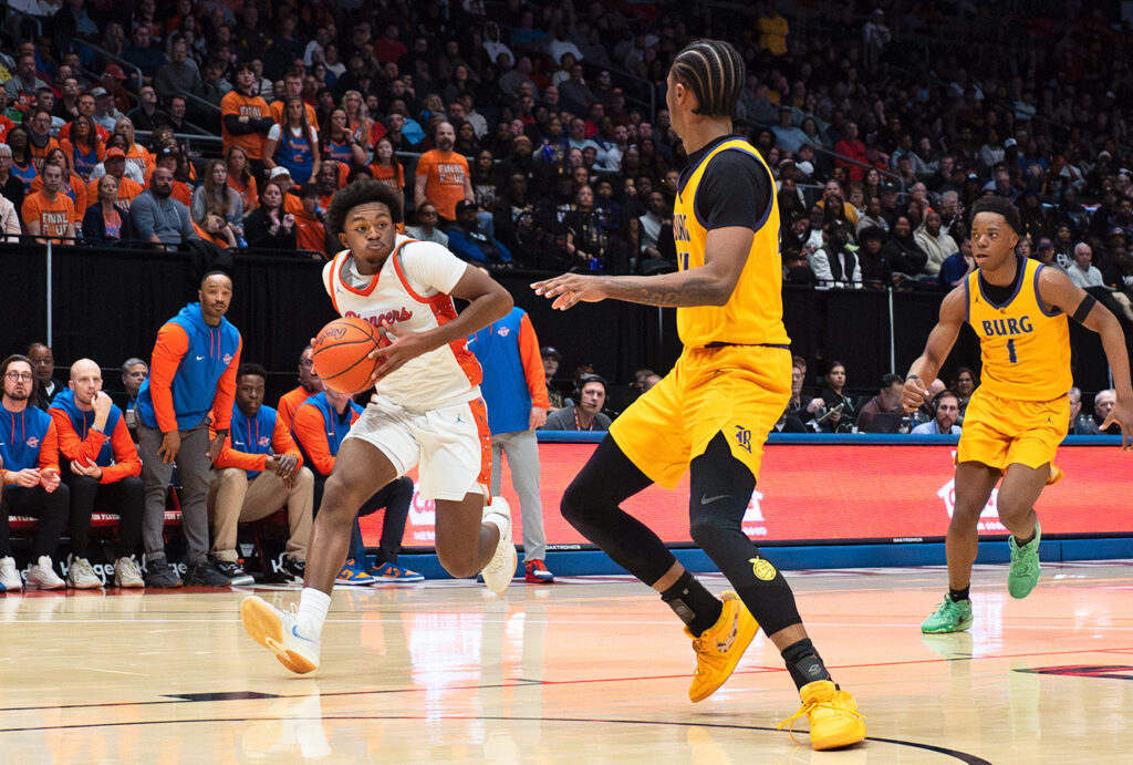 Olentangy Orange's Ellis Appiah drives baseline