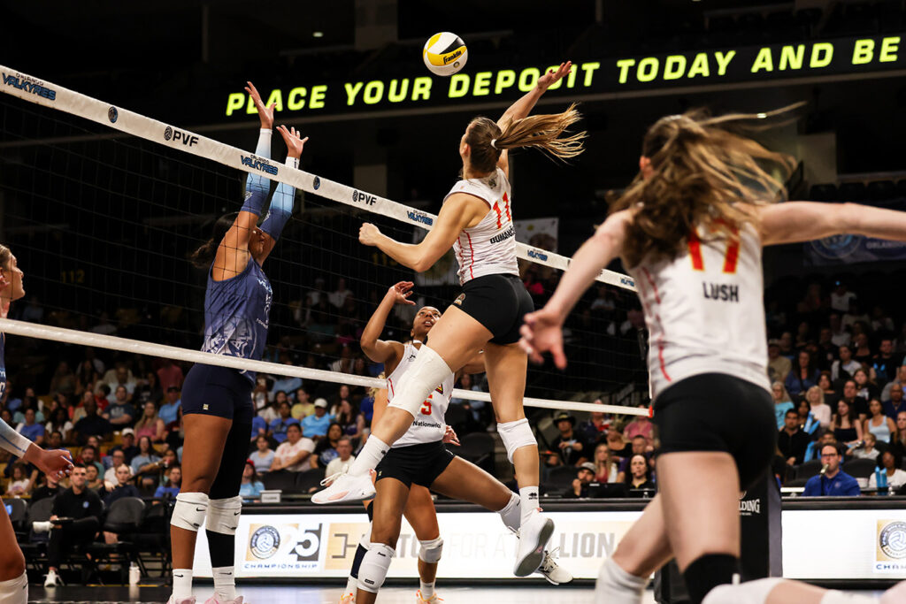 Fury's Beta Dumancic swings at net