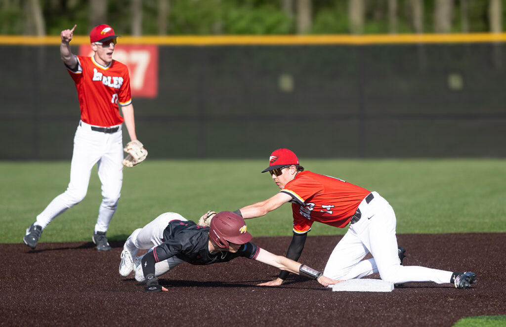 Big Walnut's Brady Taylor tags out runner