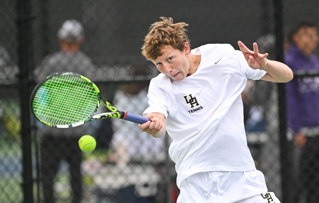 Upper Arlington's Charlie Freiberger hits tennis ball