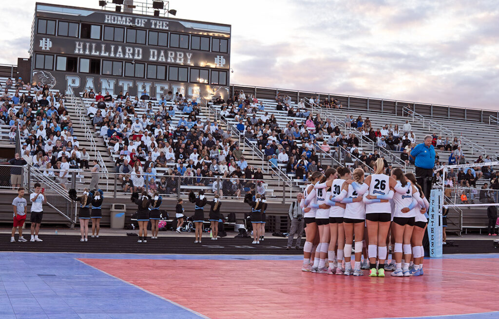 Hilliard Darby's girls volleyball team huddles