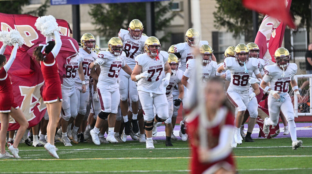 Watterson football team runs onto field