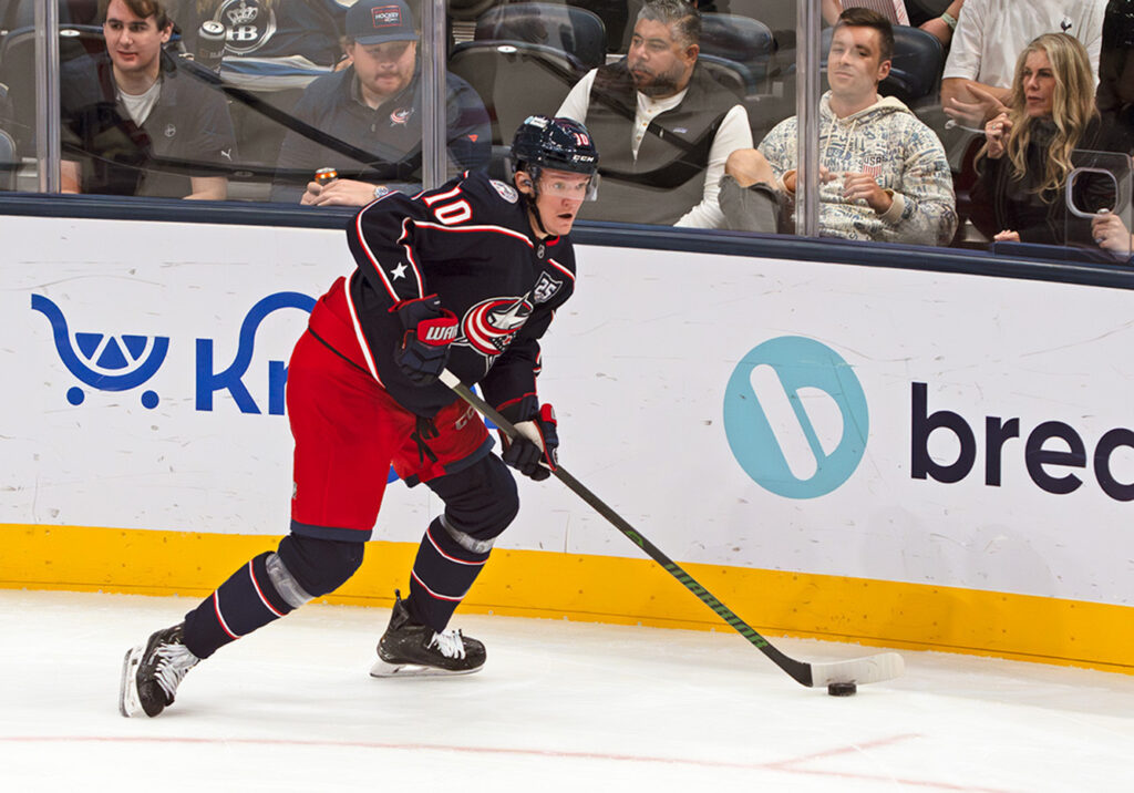 CBJ Dmitri Voronkov skates near wall