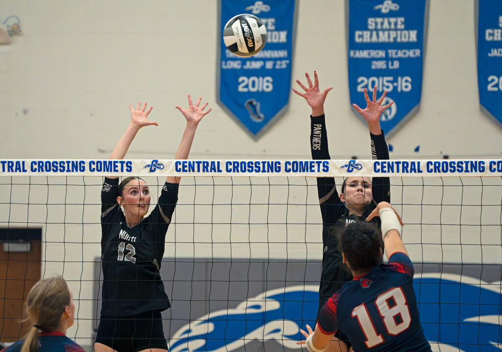 Pickerington North's Addie Gosche and Kayla Diederich block at net