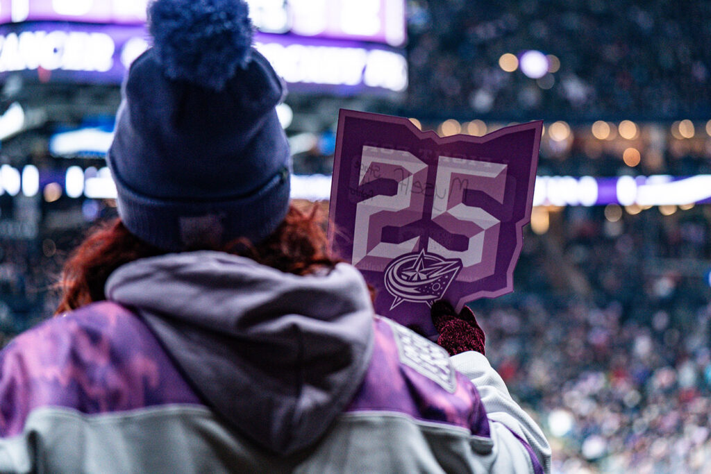 CBJ fan recognizing Hockey Fights Cancer Night
