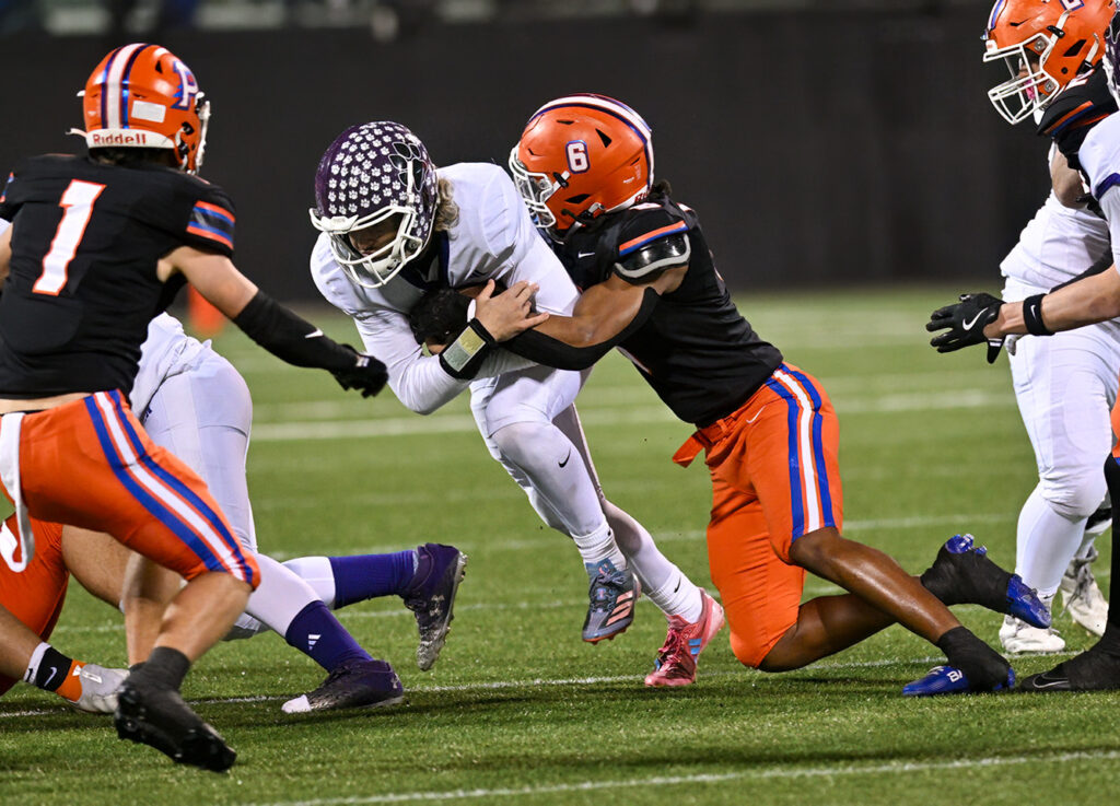 Orange's Kingston Johnson stops Central's Rocco Williams