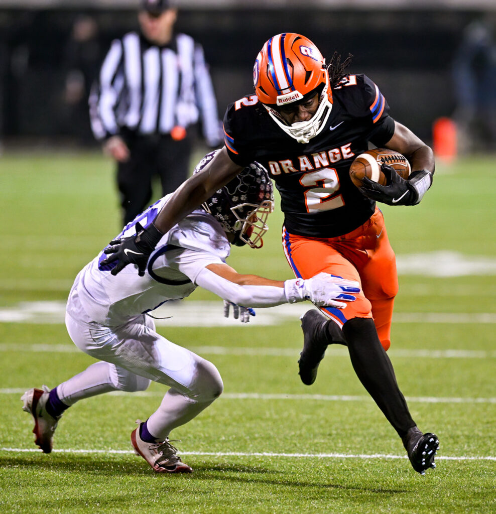 Orange's Lucas Fickel tries to elude Pick Central's Cameron Green