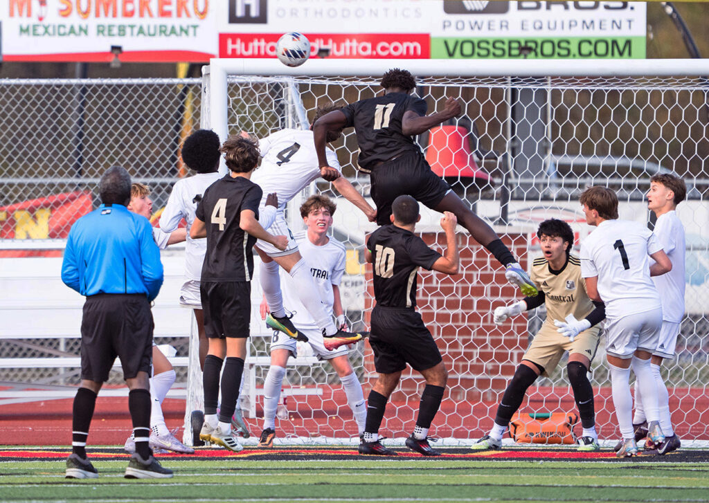 Action in front of the Westerville Central soccer net