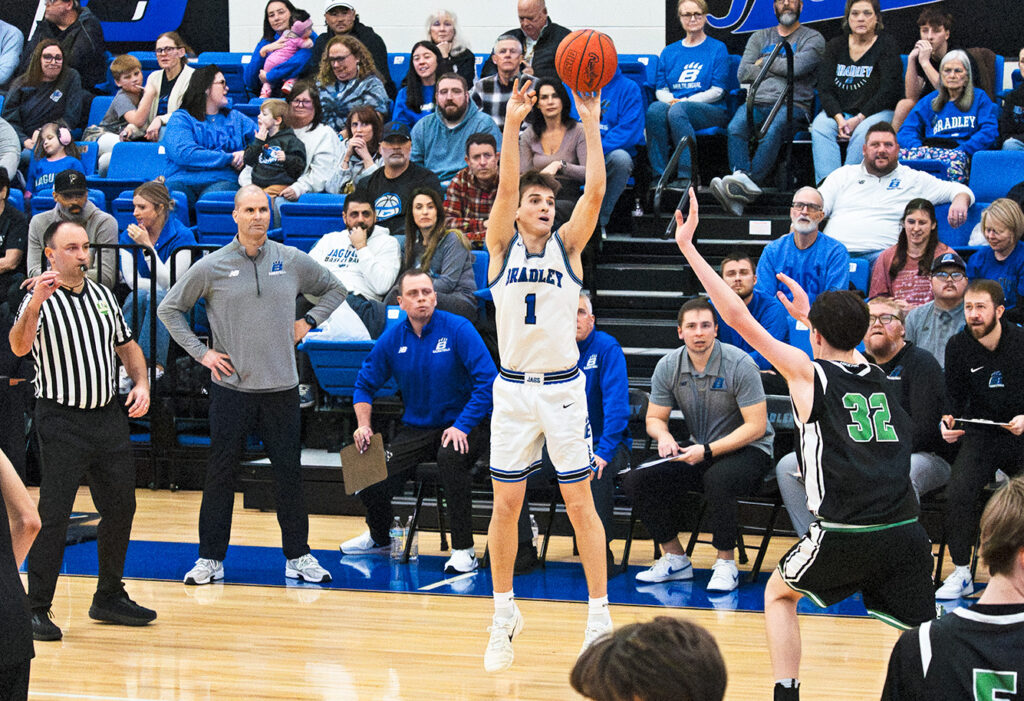 Hilliard Bradley's Kypton Norris takes a jump shot