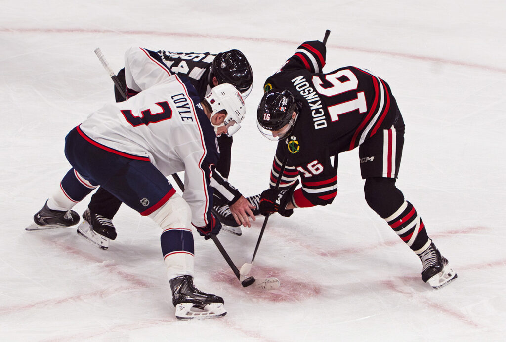 CBJ Charlie Coyle face off