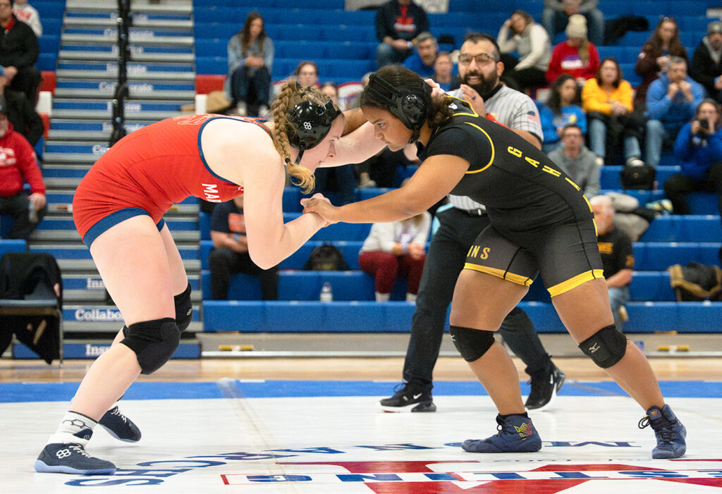 Gahanna's Jordan Mills wrestles with Marysville's Katie Hammersmith