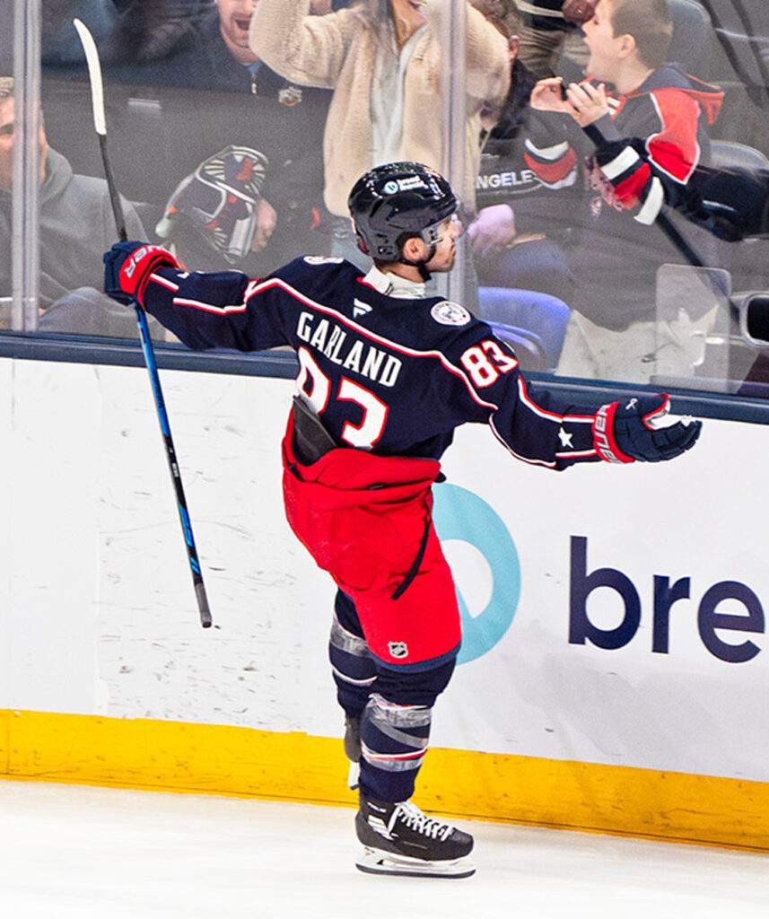 CBJ Connor Garland celebrates goal side graphic