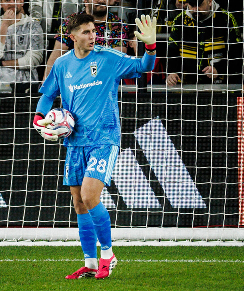 Crew's Patrick Schulte in net side graphic