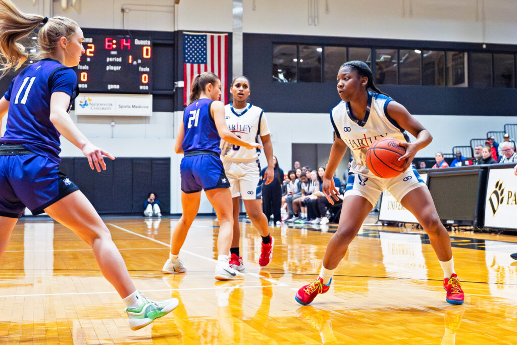 Hartley's Miah Smith looks to pass