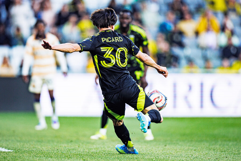 Crew's Hugo Picard kicks ball