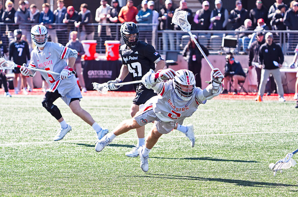 OSU's Garrett Haas dives for lacrosse ball