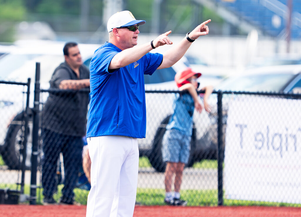Olentangy head coach Ryan Lucas at third
