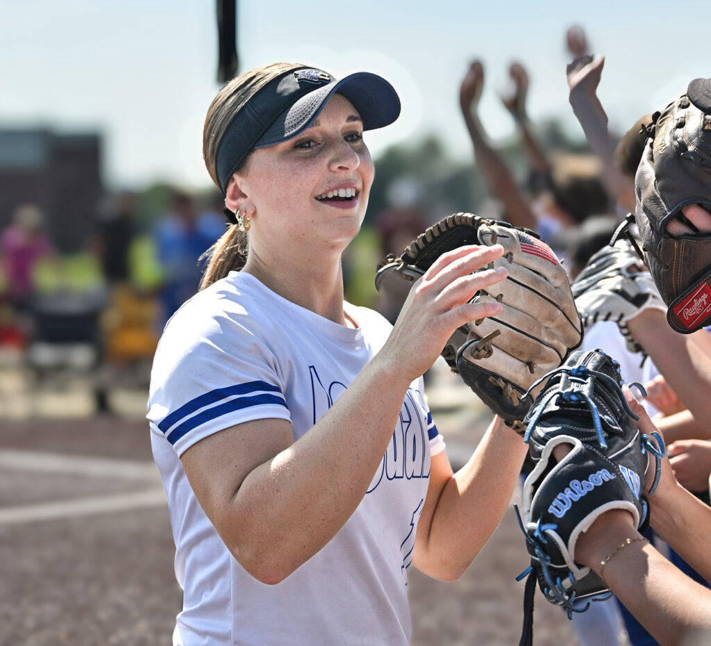 Bradley's Lainey Dennison joins teammates in pregame