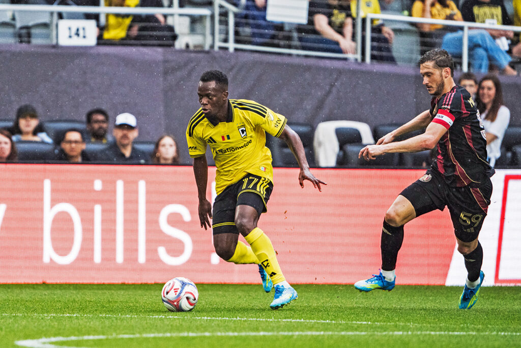 Crew's Sekou Bengoura maneuvers with ball