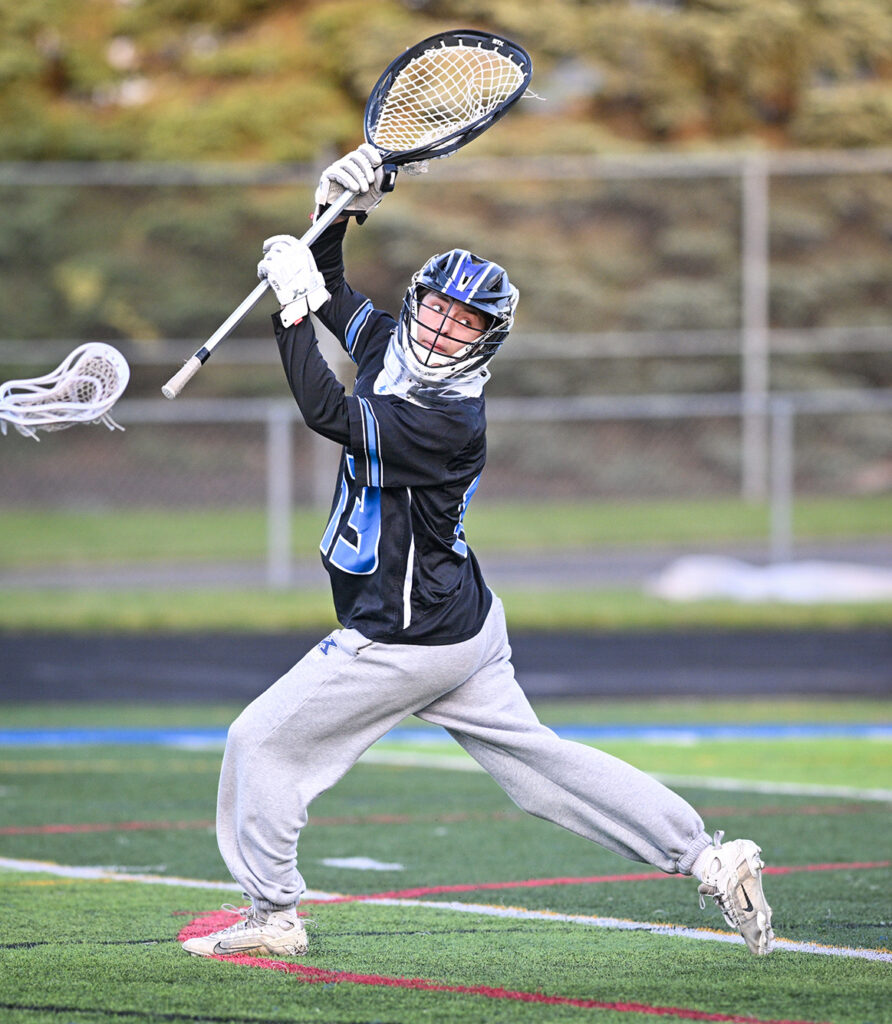Kilbourne goalie Henry Squeo after passing