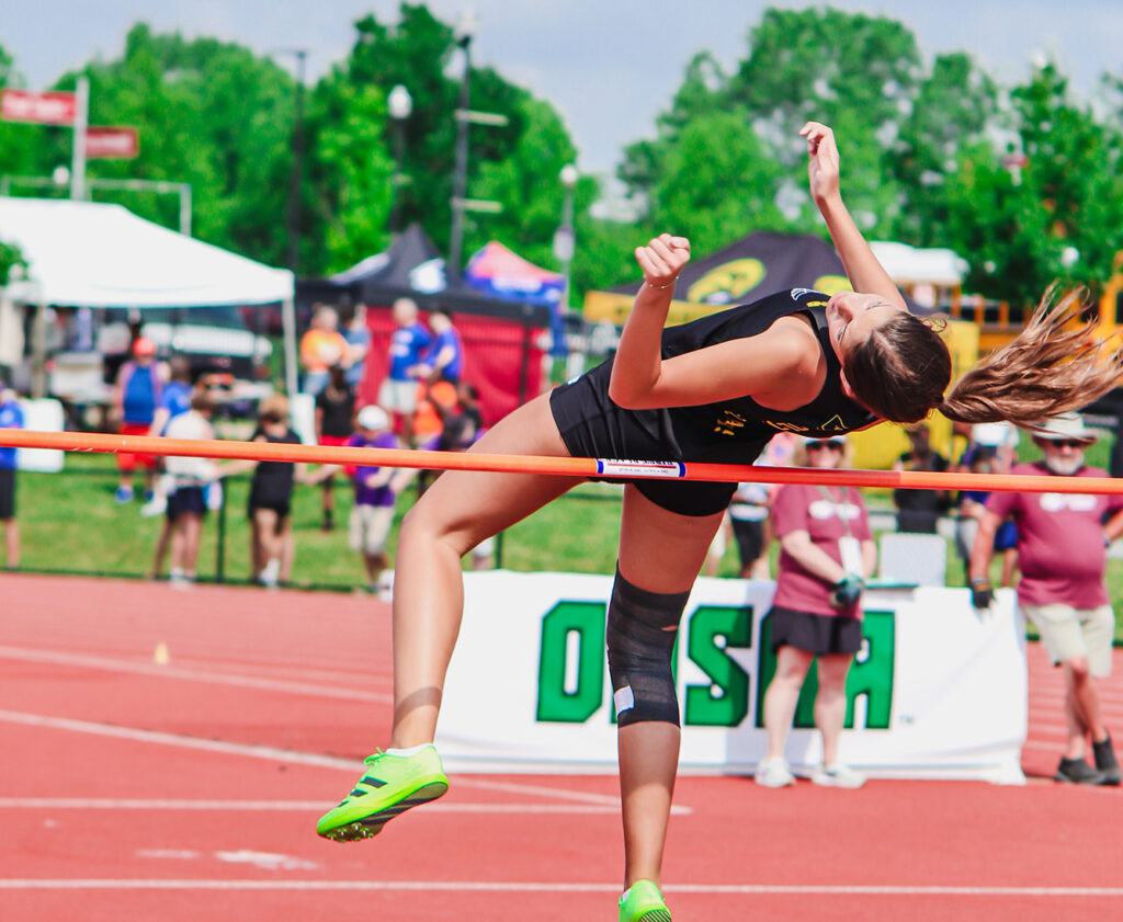 New Albany's Reese Holman high jumps