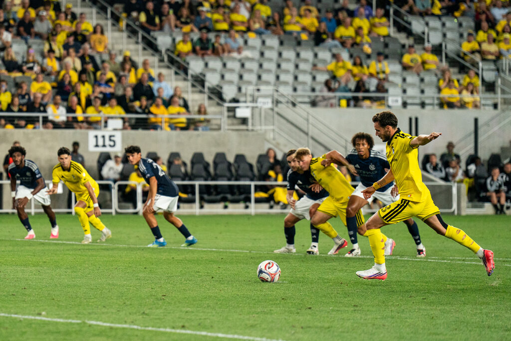 Crew's Daniel Gazdag taking a penalty kick