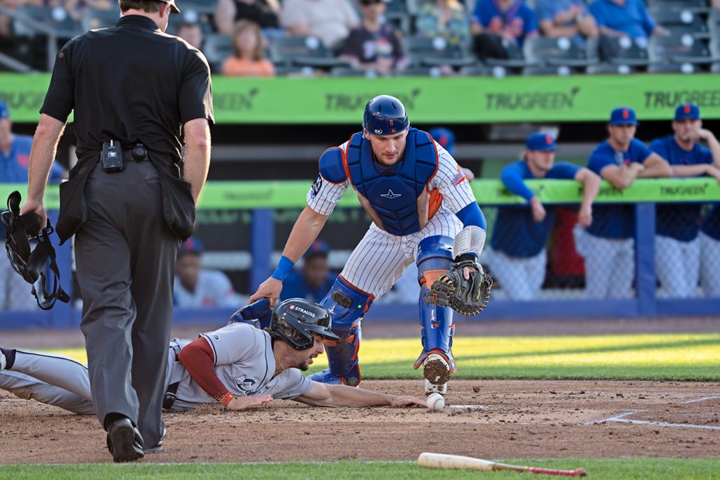 Clippers Kody Huff touches plate after slide