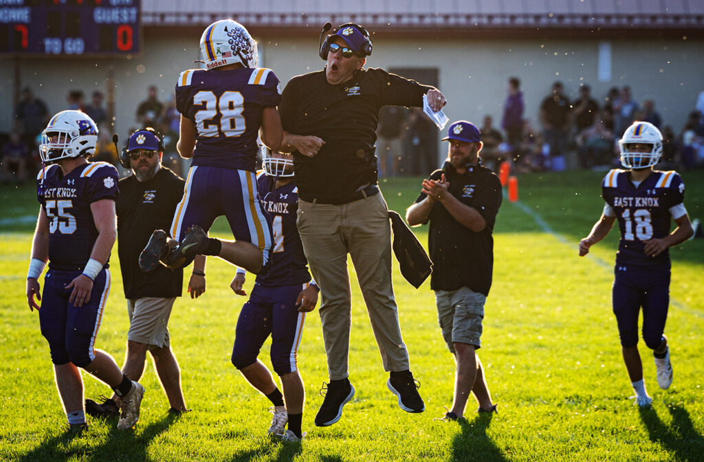 East Knox's Landon Boyd celebrates with coach