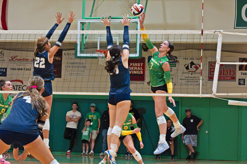 Newark Catholic's Leah Caudill hits at net